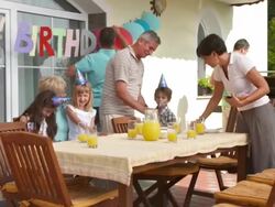 HD DOLLY: Family Setting Table For Birthday Party Stock Footage