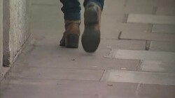 Anonymous Women Walking on Pavement News Clip