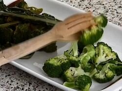 Cooked broccoli on plate Stock Footage