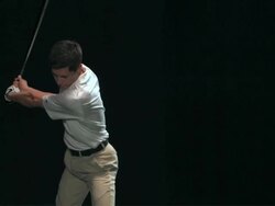 SLO MO MS Studio shot of golf player teeing off Stock Footage