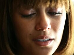 Her eyes close then tears fall. Stock Footage