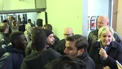 CLEAN : Marine Le Pen makes surprise visit to Paris migrant centre News Clip