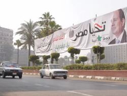 Election banner at side of road in Cairo News Clip