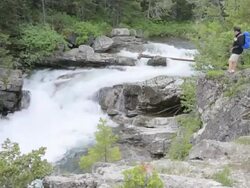 Hiker Admires Waterfall Stock Footage