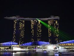 WS View of Marina bay sands hotel light show at night / Singapore Stock Footage