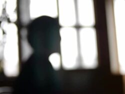 The old woman's window silhouette. Stock Footage