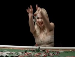 HD DOLLY: Excited Woman Throwing Gambling Chips Stock Footage