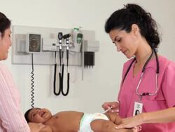 "hispanic medical worker giving a vaccination to a hispanic infant patient/Richmond,Virginia, USA" Stock Footage
