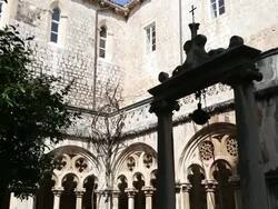 Decorated cloister with a well in rhe center,  in the Dominican monastery, Dubrovnik Stock Footage