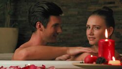 Couple relaxing in jacuzzi at beauty spa Stock Footage