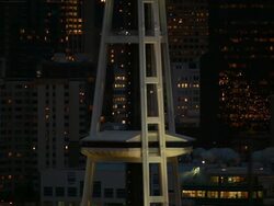 Static zoomed view looking at the middle of the Space Needle at night. Stock Footage