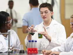 High School Students doing group science project Stock Footage