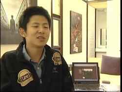 China''s first photoblogger holds an exhibition of his work in Beijing News Clip