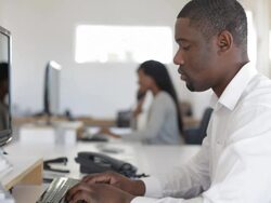 African Businessman Typing Stock Footage