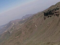 2010 AERIAL Glider flying over rocky Andes mountains / Santiago de Chile, Gran Santiago, Chile Stock Footage