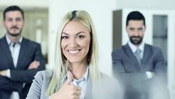 Young businesswoman with thumbs up Stock Footage