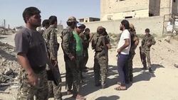 CLEAN : Syria: US backed forces inspect damage in a Raqa neighbourhood News Clip