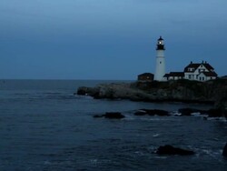 WS Lighthouse overlooking ocean at night / Portland, ME, United States Stock Footage