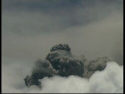 CU grey smoke and ash cloud, zoom out to WA, Mount Tunguragua, Ecuador Stock Footage