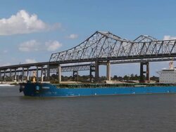 Ship Passing Under Mississippi River Bridge Stock Footage