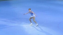 TS Female figure skater performing her program Stock Footage
