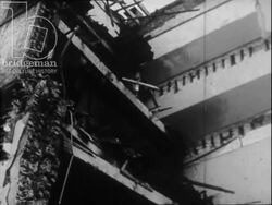 Damaged buildings, US government agency offices. Clip from 1960s Cold War educational film. Stock Footage