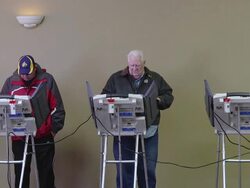 MS Shot of Voters cast ballots at copmuter terminals during voting at union hall / Toledo, Ohio, United States Stock Footage