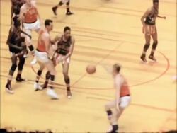 Harlem Globetrotters playing basketball Stock Footage