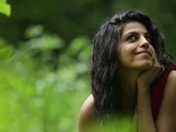 Woman in a forest, Malshej Ghat, Maharashtra, India Stock Footage