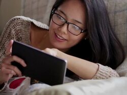 Tablet sofa woman   CM LI Stock Footage