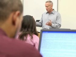 Caucasian Male Teaching Adult Students - MS Stock Footage