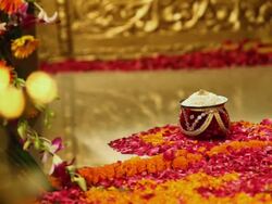 Indian bride falling rice from her feet on the entrance  Stock Footage