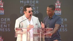 Kenneth Branagh plants his hands and feet in cement at Hollywood's famous Chinese Theatre News Clip