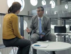 Business meeting in office lobby Stock Footage