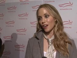 INTERVIEW: Elizabeth Berkley explains why Michael J. Fox is truly a hero Stock Footage