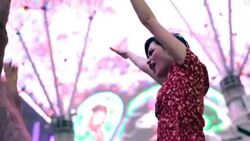 Young couple dance wildly under an epic light-show in downtown Las Vegas Stock Footage