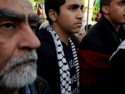 January 23, 2009 Men listening to speaker during protest against Israel's attack on Gaza Strip/ Washington DC/ AUDIO Stock Footage