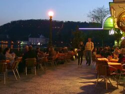 MS People setting outside of restaurant near charles bridge / Prague, Hlavni mesto Praha, Czech Republic Stock Footage