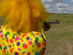 HD 1080i Clown Shooting a Rifle Stock Footage