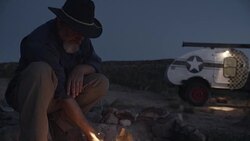 Middle-Aged Caucasian Male Enjoys Campfire Stock Footage