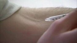 A drug user injects heroin. Stock Footage