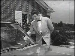 Montage: young man admiring AMC Ambassador Stock Footage