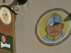 MS View of restaurant sign and picture on wall / Prague, Hlavni mesto Praha, Czech Republic Stock Footage