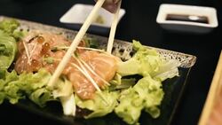 Girl Hand eating Salmon salad Stock Footage