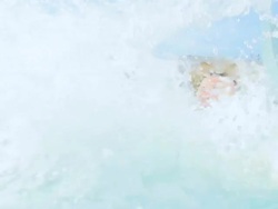 HD SUPER SLOW-MO: Couple Having Fun On Water Slide Stock Footage