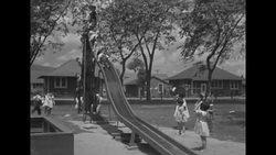 Children play at playground in sugar plantation housing area News Clip