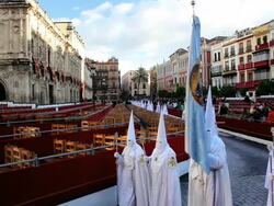 Hooded Nazarenos preparing to parade during the celebration of Semana Santa a Holy week in Malaga Spain, Europe Stock Footage
