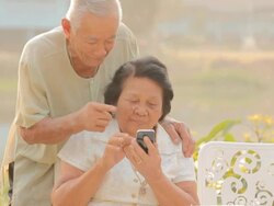 Senior couple using the mobile phone Stock Footage
