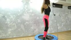 Group of women in the gym jumping on a mini trampoline Stock Footage
