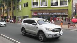 Queues outside Manila supermarket amid virus News Clip